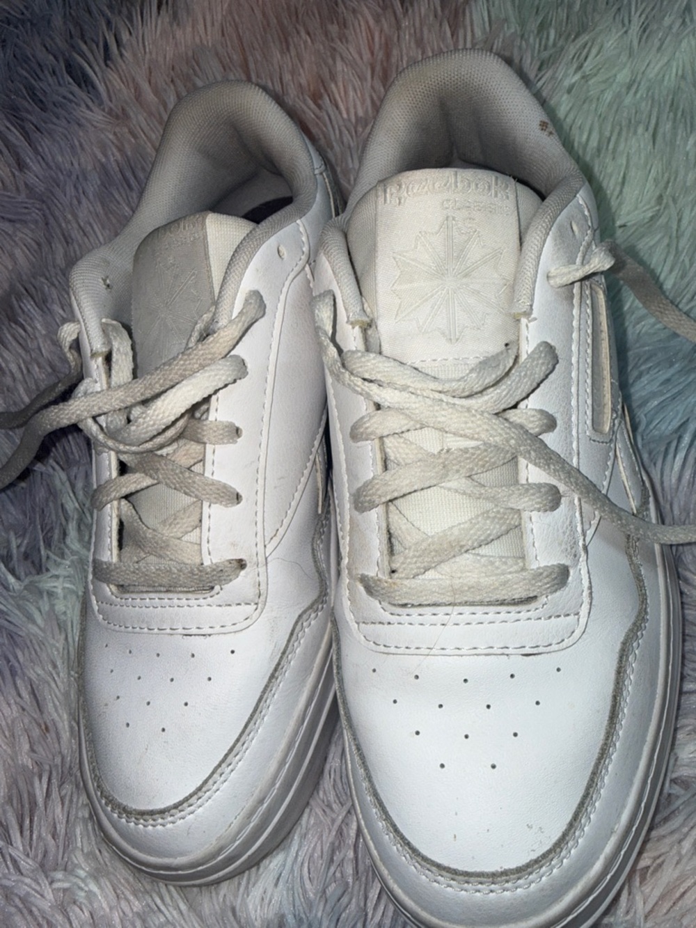 Reebok’s White Lace-Up Casual Sneakers memory tech